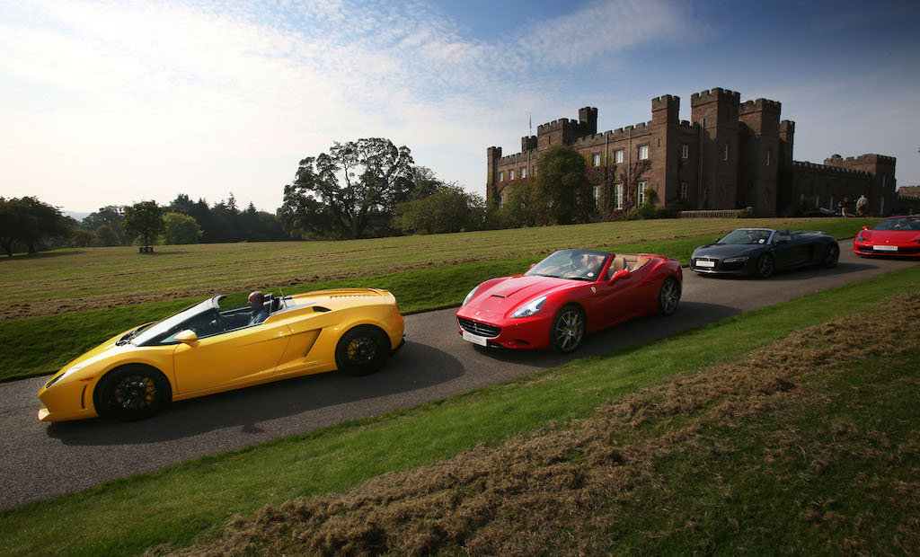 Farrari's and Lamborghini's line up at Scone Palace as drivers get a chance to tour the highlands in the supercars the Land Athol rally sets off 11th September 2014 from Scone Palace Perthshire and returns to Edinburgh's Royal Mile 14th September 2014.Photo copyright free for first use David Cheskin.